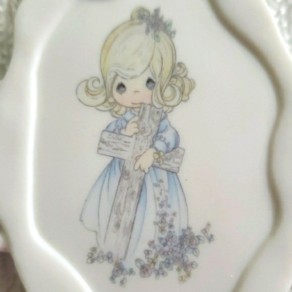 Precious Moments ceramic cross. "1990"